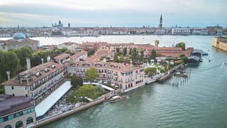 Aerial view of Belmond Hotel Cipriani, with St Mark's square in the distance