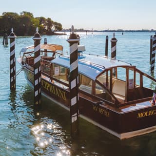 Traditional Venetian vaporretto emblazoned with 'Hotel Cipriani' in gold lettering