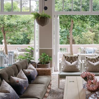 Open bi-folds and pot-plants bring the outside into the Lounge, where a chic area with luxurious seating beckons relaxation.