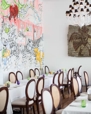 The restaurant shows how cutting edge modern artworks decorate walls throughout the hotel