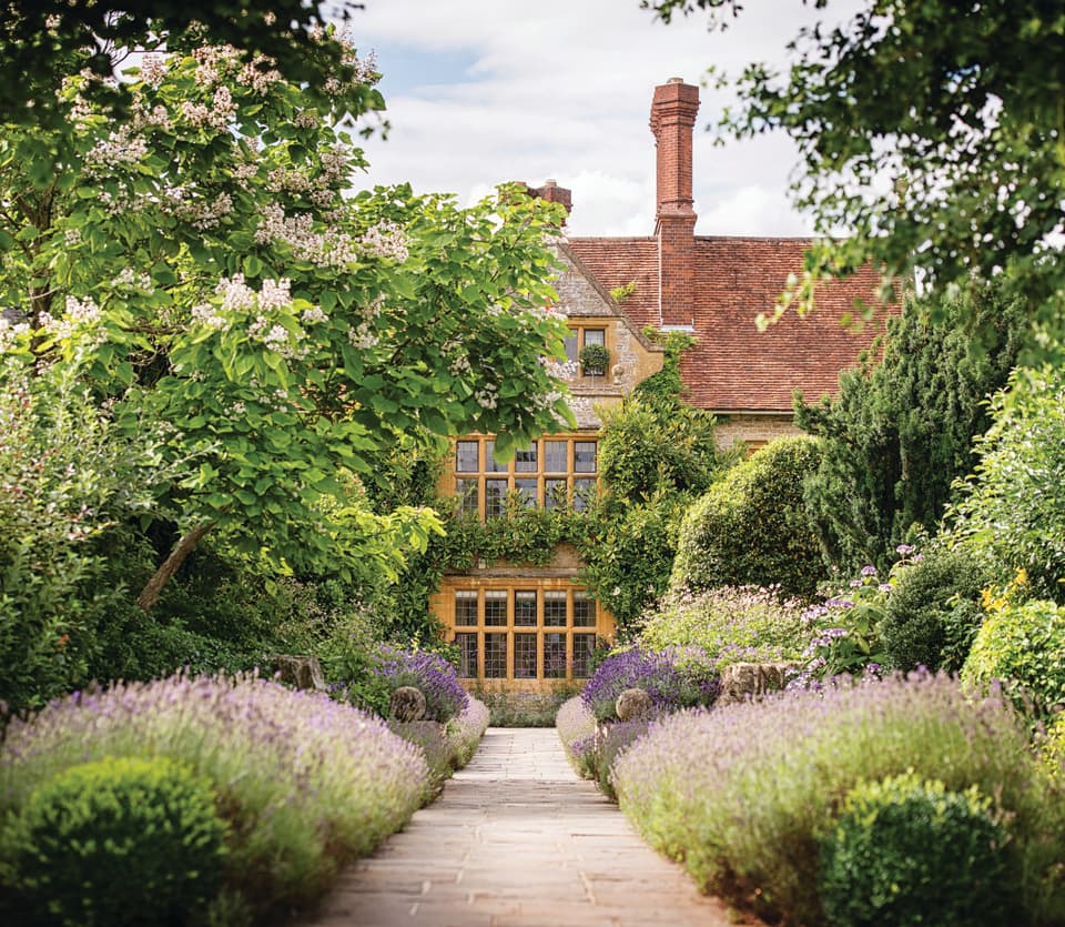 Stunning rural manor-house among lush manicured gardens