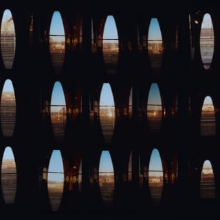 A collage of images, photographed by Coco Capitán, hint at the changing views and life-moments beyond the carriage windows.