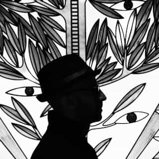 A silhouette of artist, JR in front of a stained glass design of an olive tree sprouting leaves and two eyes, in monochrome.